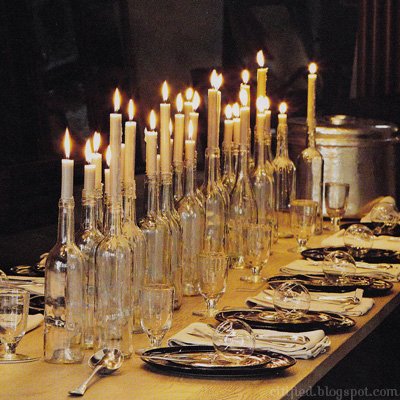 Wine bottles hold candles